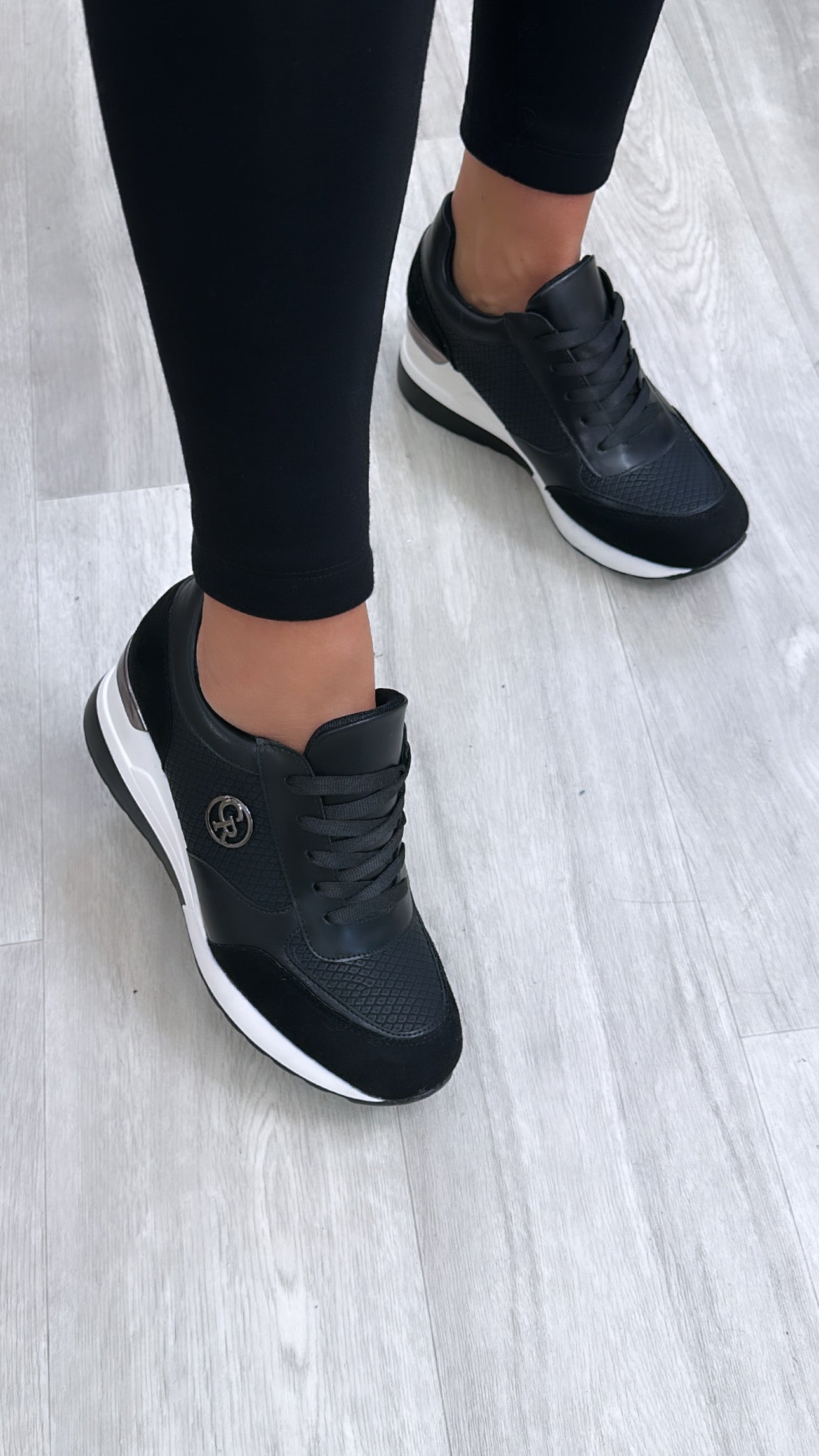 Zoya Black Wedge Heel Trainers