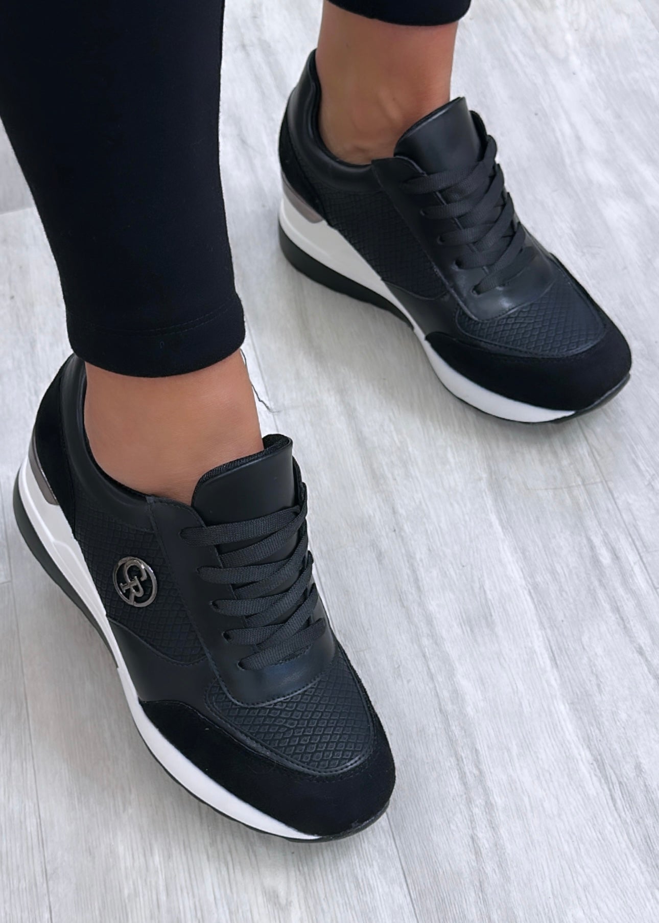 Zoya Black Wedge Heel Trainers