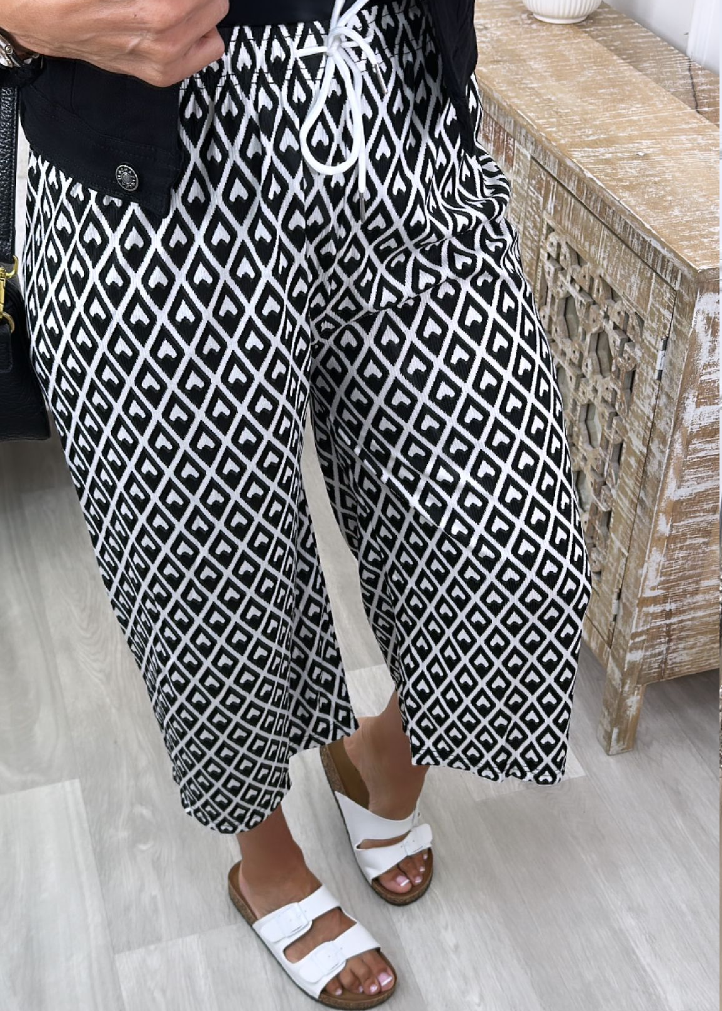 Dominica Black Hearts Print Trousers